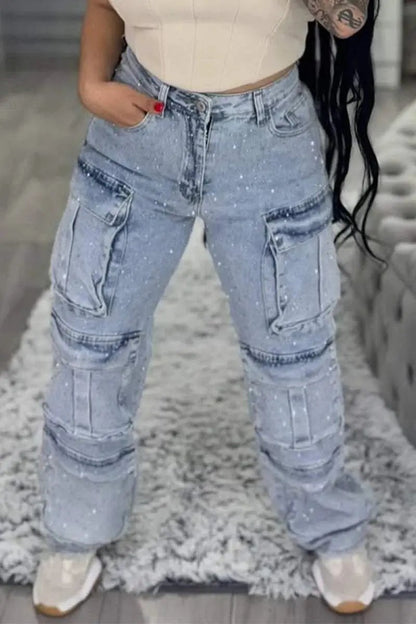 Women's light blue cargo denim jeans with multiple pockets, knee panels, paint splatter on Tampa Home & Garden Store