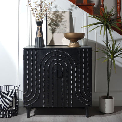 Modern black wood storage cabinet with decorative door; features studded circular panels on Tampa Home & Garden Store