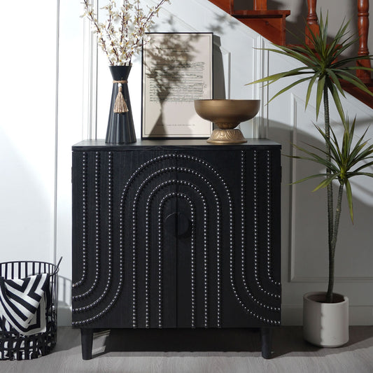 Modern black wood storage cabinet with decorative door; features studded circular panels on Tampa Home & Garden Store