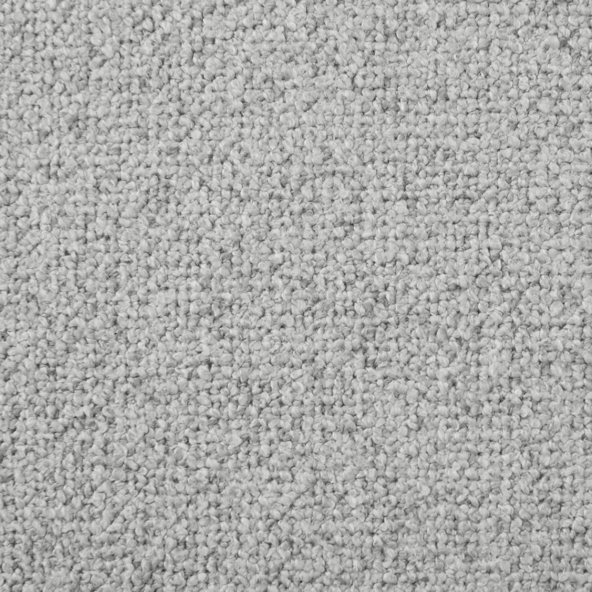 Stationary sectionals gray plush carpet texture close-up on Tampa Home & Garden Store
