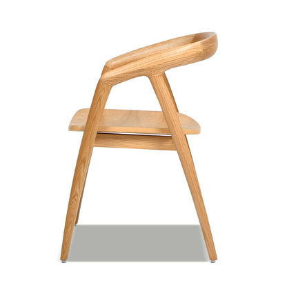 Scandinavian sculpted dining chair armchair in warm natural brown wood by HouseOfZazla on Tampa Home & Garden Store