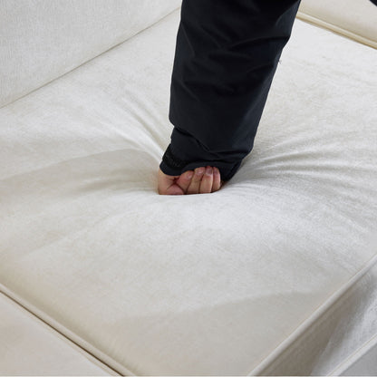 L-Shaped sectional sofa white fabric upholstery close-up of cushions on Tampa Home & Garden Store