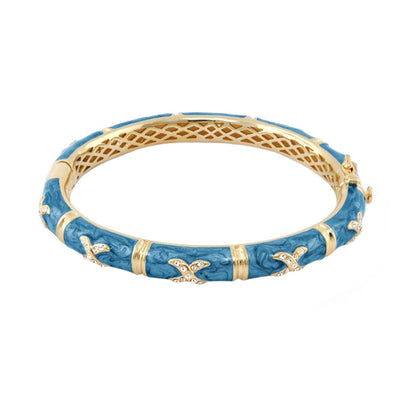 Elegant Hugs Bangle Wide Pavé X blue enamel bracelet by Lauren G Adams with gold accents on Tampa Home & Garden Store