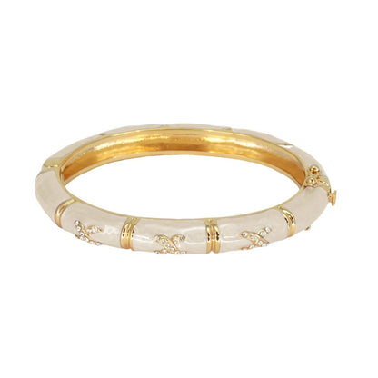 Elegant Hugs Bangle Pavé X bracelet gold-tone with white enamel and X accents by Lauren G Adams on Tampa Home & Garden Store