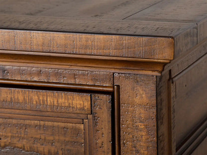 Bay Creek rectangular end table in distressed warm brown wood with textured grain on Tampa Home & Garden Store