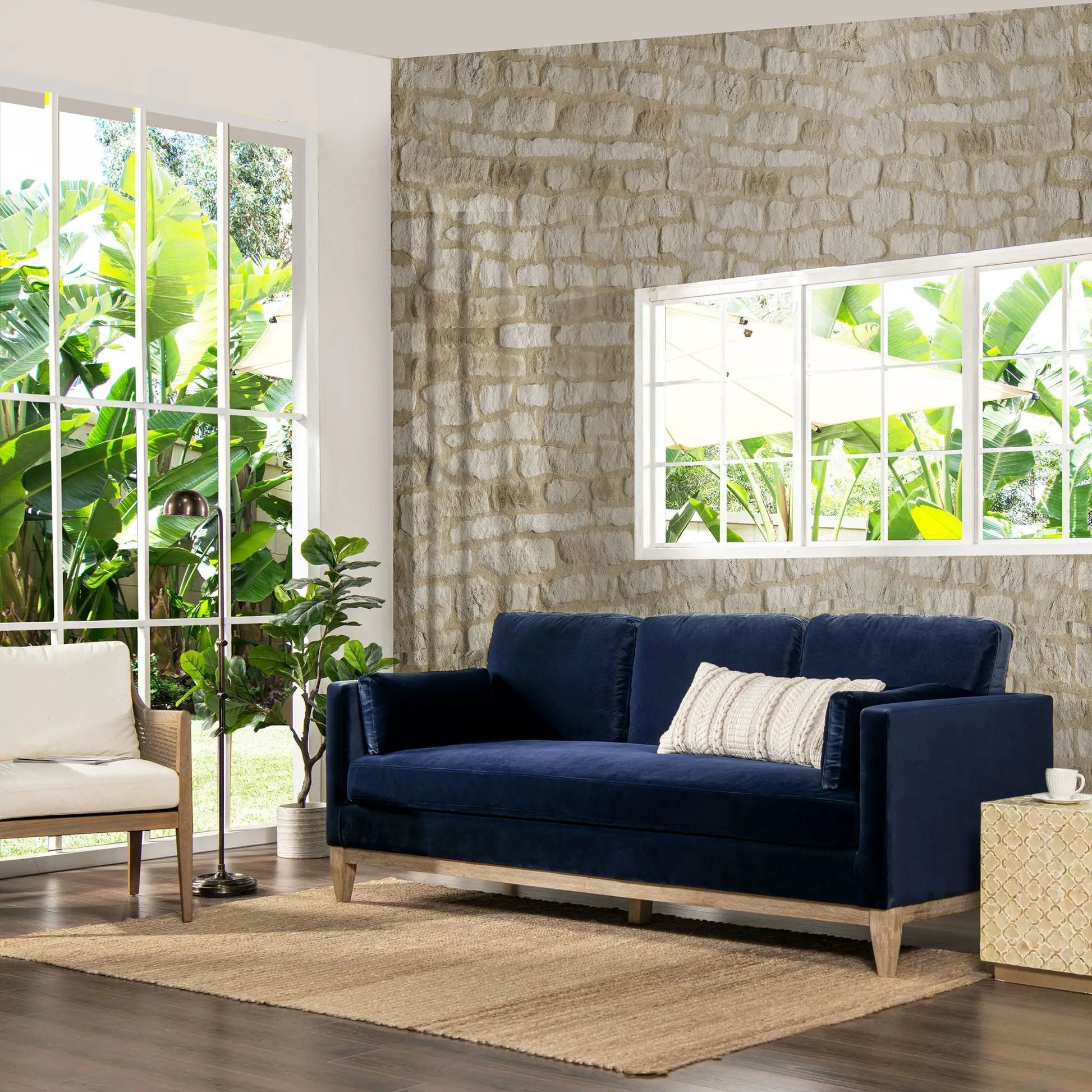 Knox Modern Farmhouse Sofa blue velvet stationary sofa with wood legs beside beige accent chair on Tampa Home & Garden Store