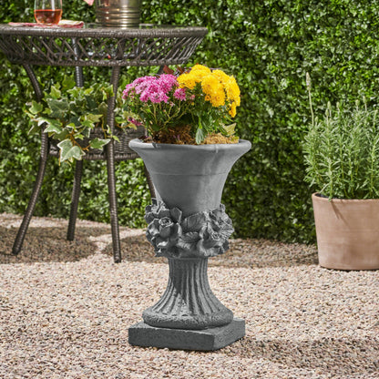 MGO Garden Urn Planter gray stone with pink and yellow flowers on Tampa Home & Garden Store