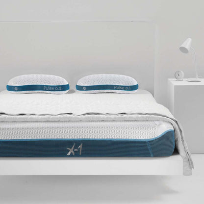 BedGear X-1 Edge Full Mattress with cover and blue base Pulse 0.1 and 0.2 pillows on bed on Tampa Home & Garden Store