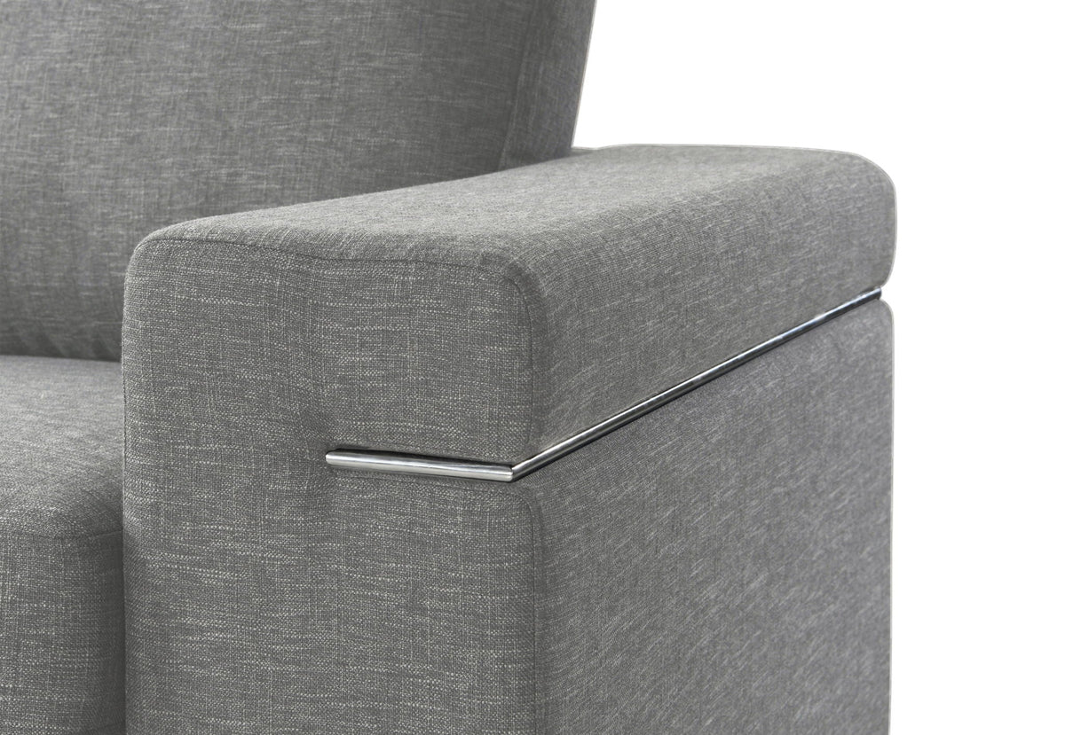 Fabric arm chair with oversized arms and chrome metal accents in gray upholstery on Tampa Home & Garden Store
