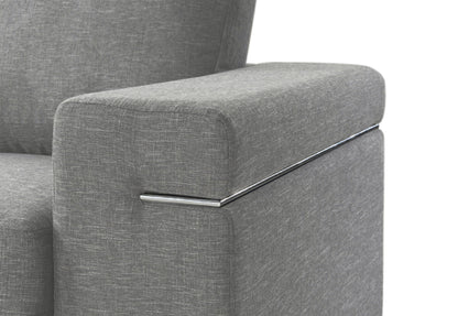 Fabric arm chair with oversized arms and chrome metal accents in gray upholstery on Tampa Home & Garden Store