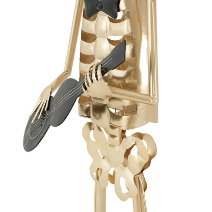 Black Metal Skeleton Musician Statue with gold-tone finish, playing a black guitar on Tampa Home & Garden Store