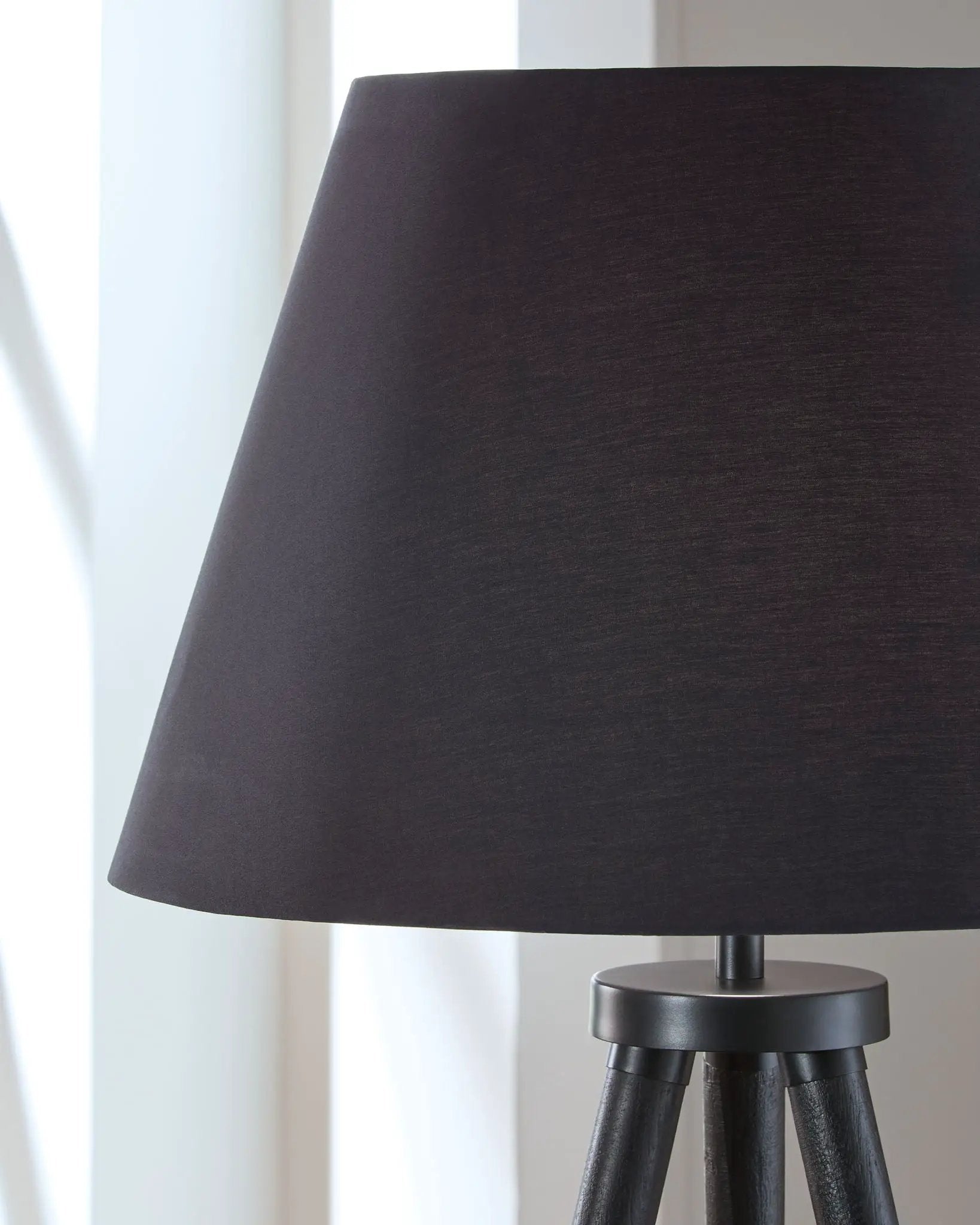 Orhan black wood floor lamp with dark wood tripod legs and charcoal shade on Tampa Home & Garden Store