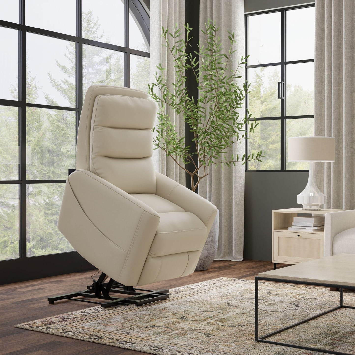 Bentley Power Lift Chair beige leather recliner with USB charging in a bright living room on Tampa Home & Garden Store