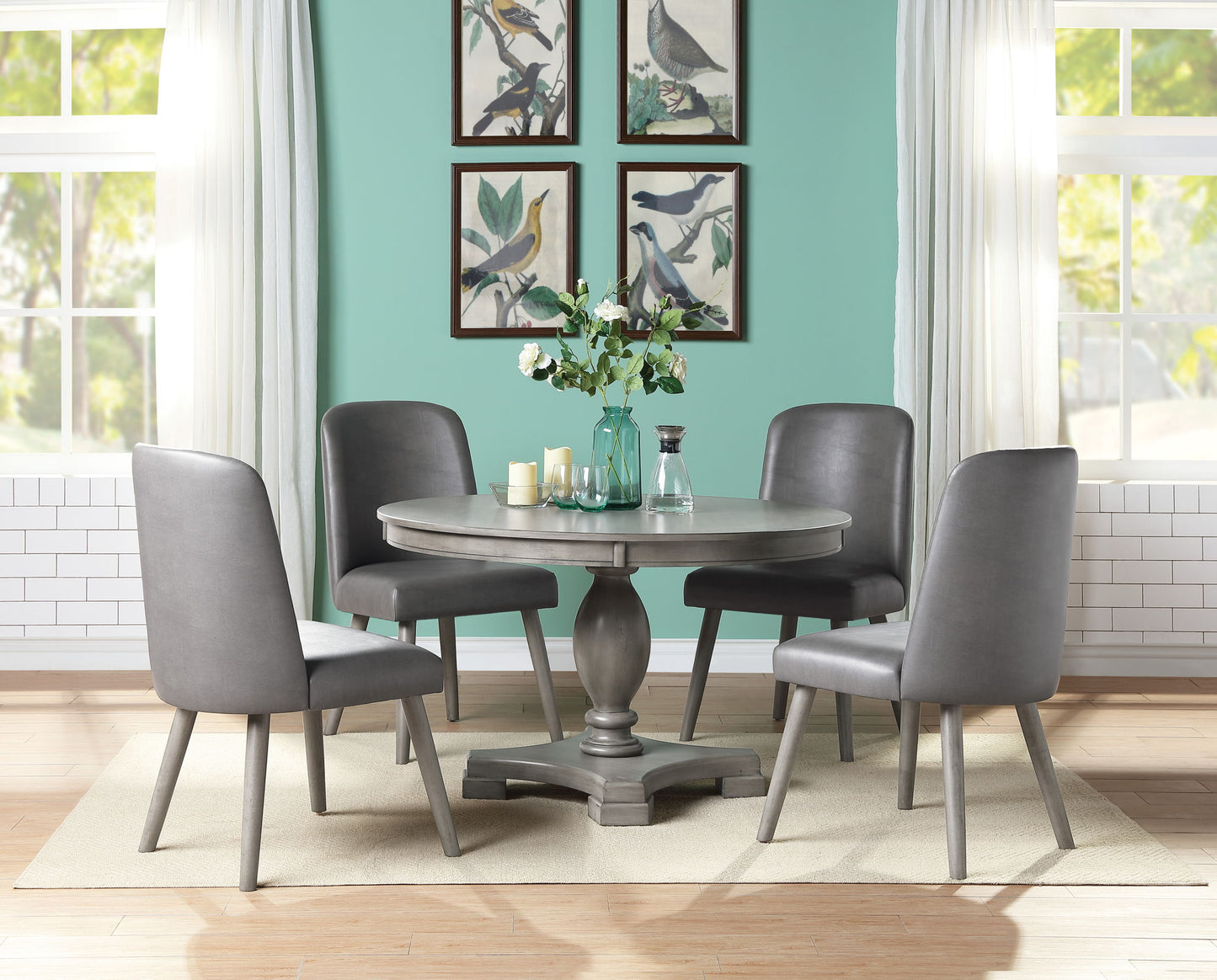 Waylon 5-Piece Dining Room Set gray chairs around a round table in a modern dining space on Tampa Home & Garden Store