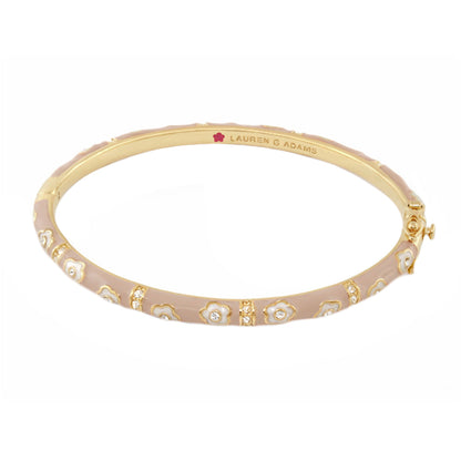 Daisy Love Stackable Bangle by Lauren G Adams, pink enamel with white floral motifs on gold on Tampa Home & Garden Store
