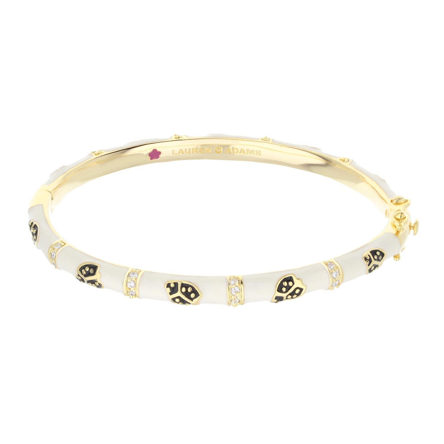 Lady Poof Stackable Bangle, Lauren G Adams gold bracelet with white enamel skull motifs on Tampa Home & Garden Store