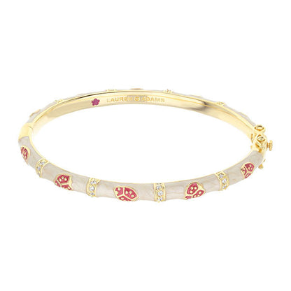 Lady Poof Stackable Bangle by Lauren G Adams, gold-tone bracelet with white enamel and red accents on Tampa Home & Garden Store