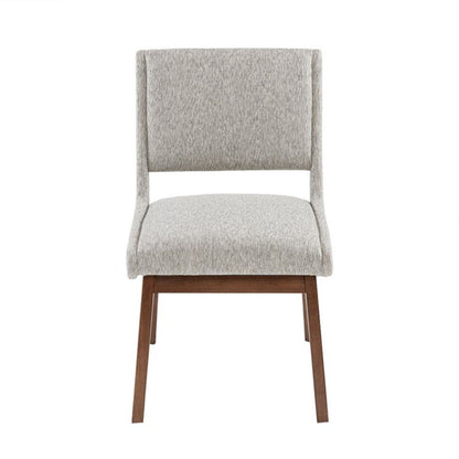 Dining side chair with light gray upholstered fabric and wooden legs on Tampa Home & Garden Store