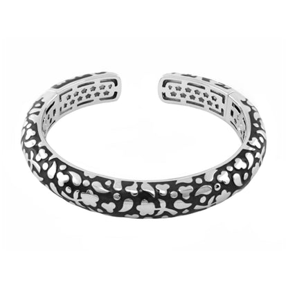 Flowers by Orly Bangle Slim Pebble Cuff silver-tone hinged bracelet with floral cutouts on Tampa Home & Garden Store