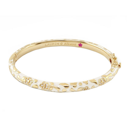 Gold-tone stackable bangle with white enamel floral pattern and crystal accents by Lauren G Adams on Tampa Home & Garden Store