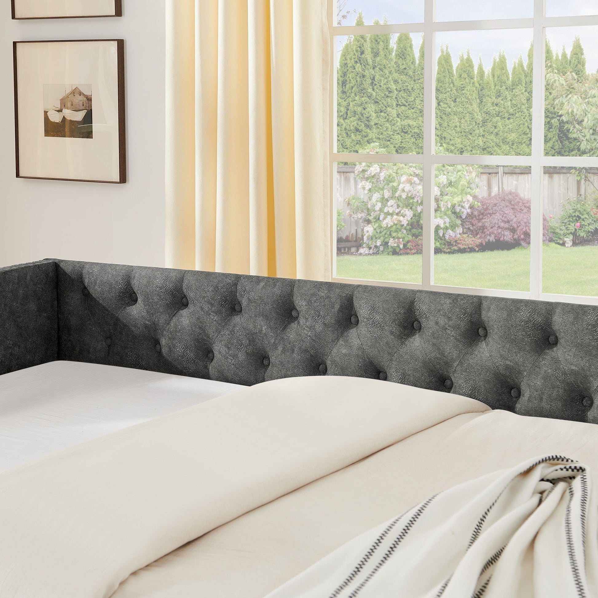 Upholstered daybed with USB charging & pullout bed in gray tufted fabric on Tampa Home & Garden Store