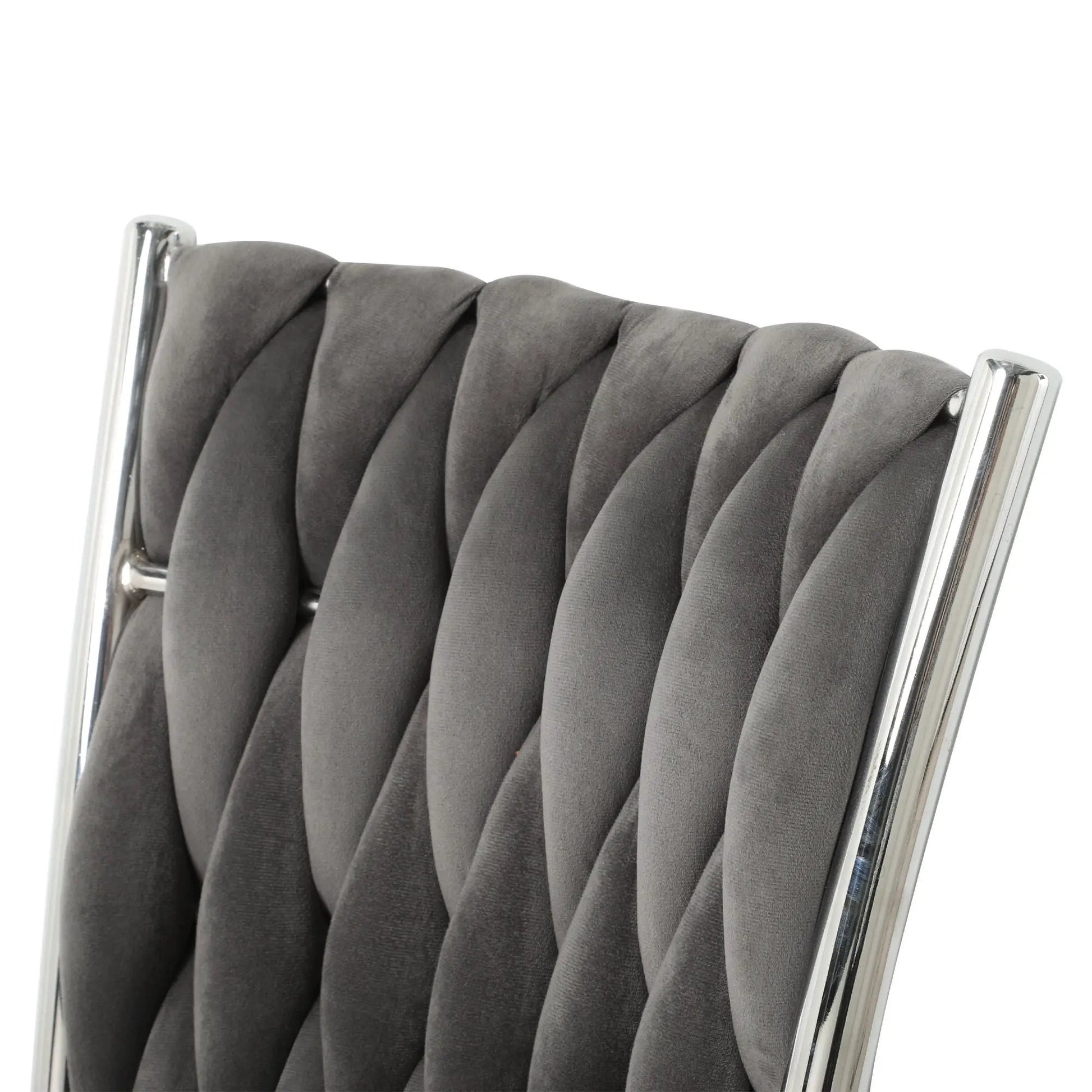 Modern dining chair with vertical tufted dark gray upholstery and chrome frame on Tampa Home & Garden Store