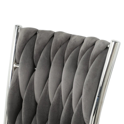 Modern dining chair with vertical tufted dark gray upholstery and chrome frame on Tampa Home & Garden Store