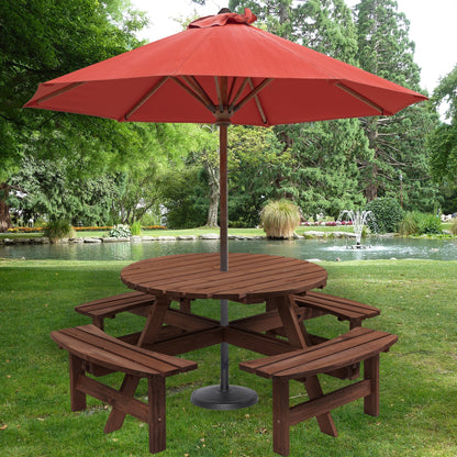 8 Person wooden round picnic table with benches under a red umbrella in a garden on Tampa Home & Garden Store