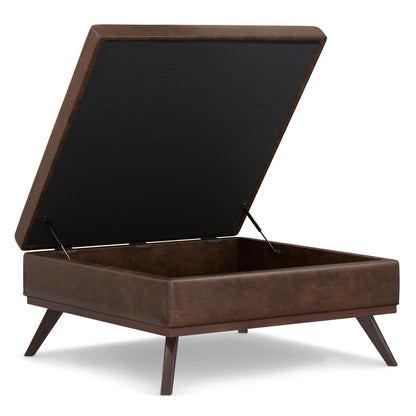 Square lift-top coffee table and storage ottoman in brown faux leather with angled legs on Tampa Home & Garden Store