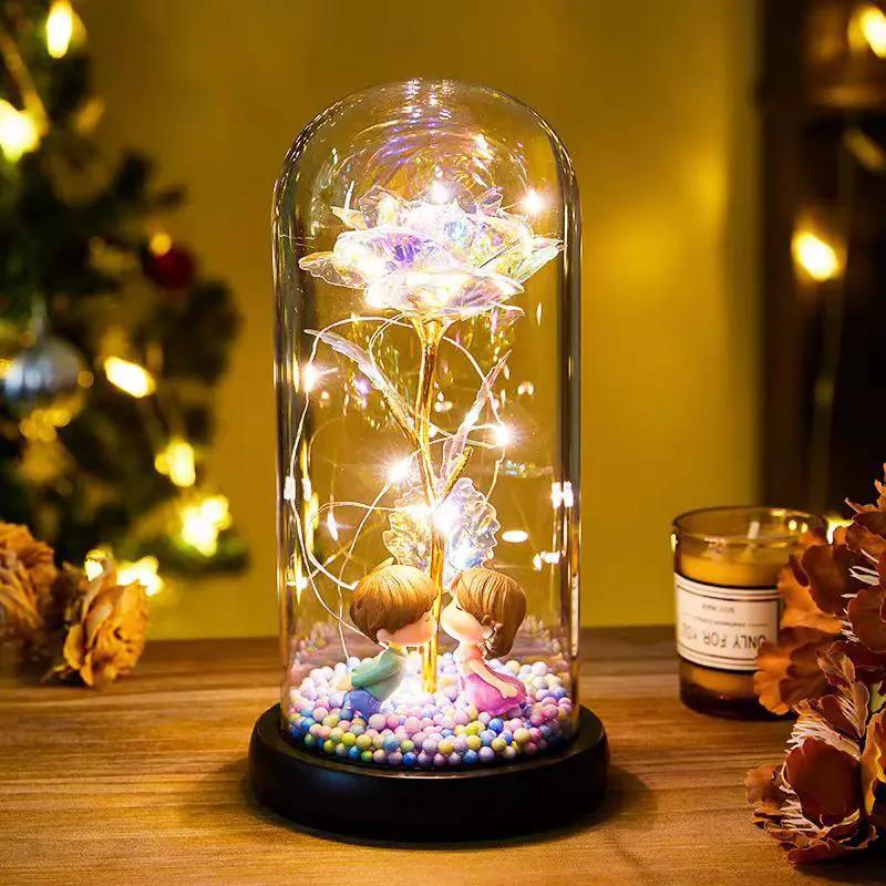 Eternal Rose LED light under a glass dome with foil blossom and couple on black base on Tampa Home & Garden Store