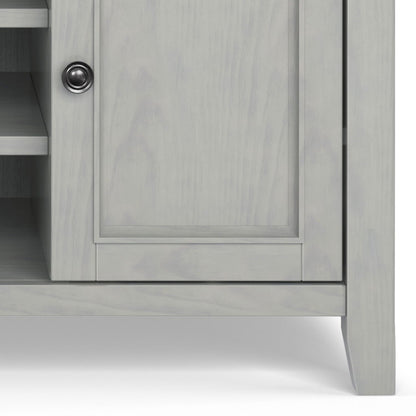 Solid wood TV stand in light gray finish with cabinet door and left open shelving on Tampa Home & Garden Store