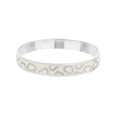 Lots of Love Slip-On Bangle bracelet in silver with embossed heart motif by Lauren G Adams on Tampa Home & Garden Store