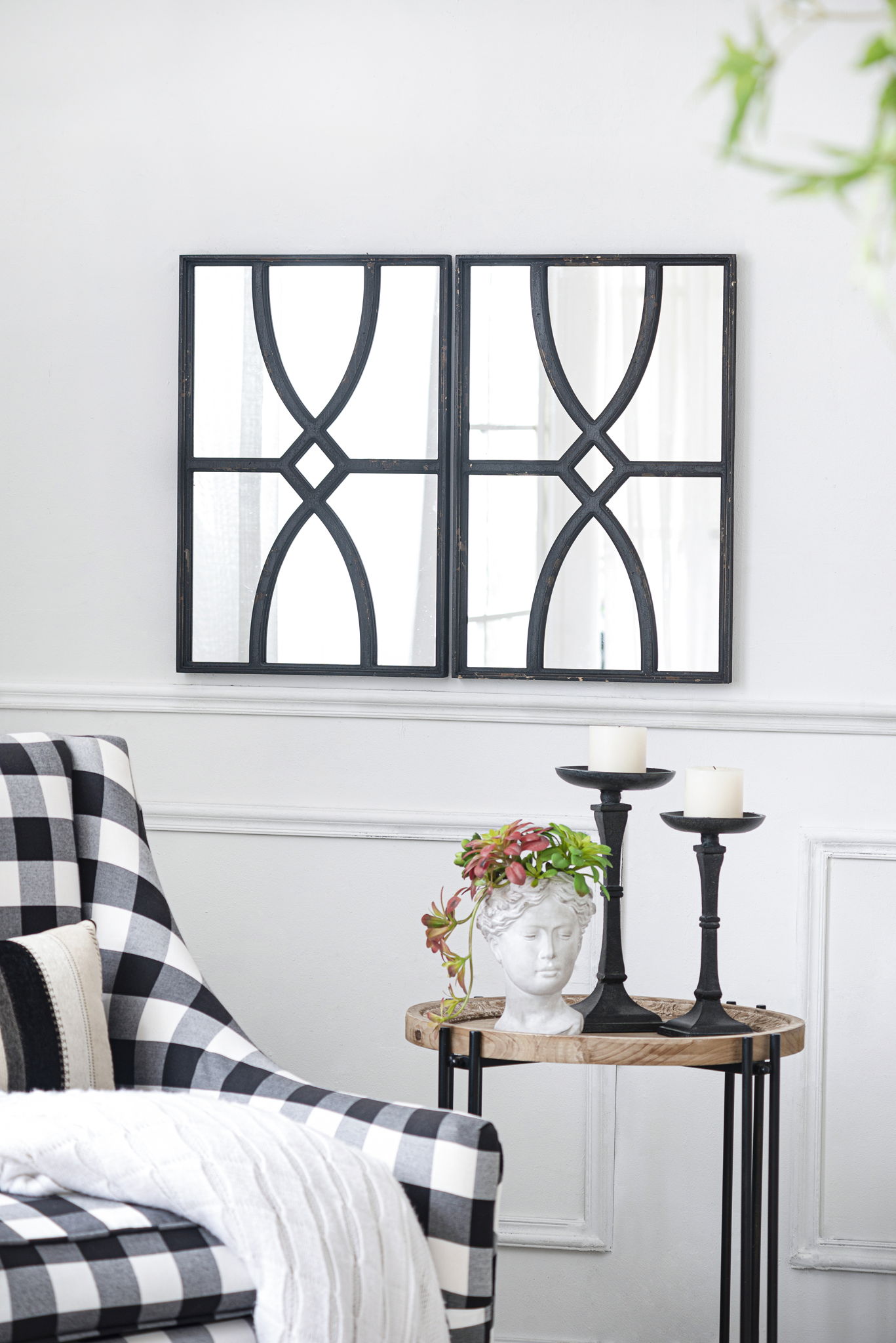 Rectangular wall mirrors pair with dark antique metal frames and geometric cross motif on Tampa Home & Garden Store