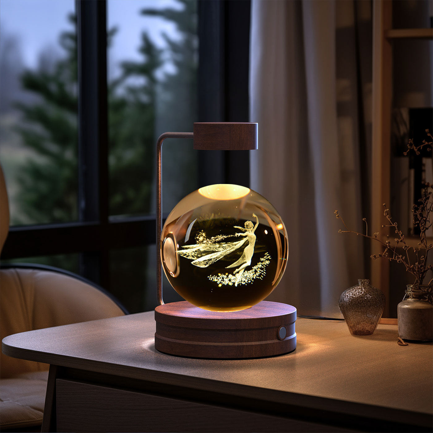Crystal Ball night light with warm amber glow, glass sphere on wooden base and metal arc on Tampa Home & Garden Store
