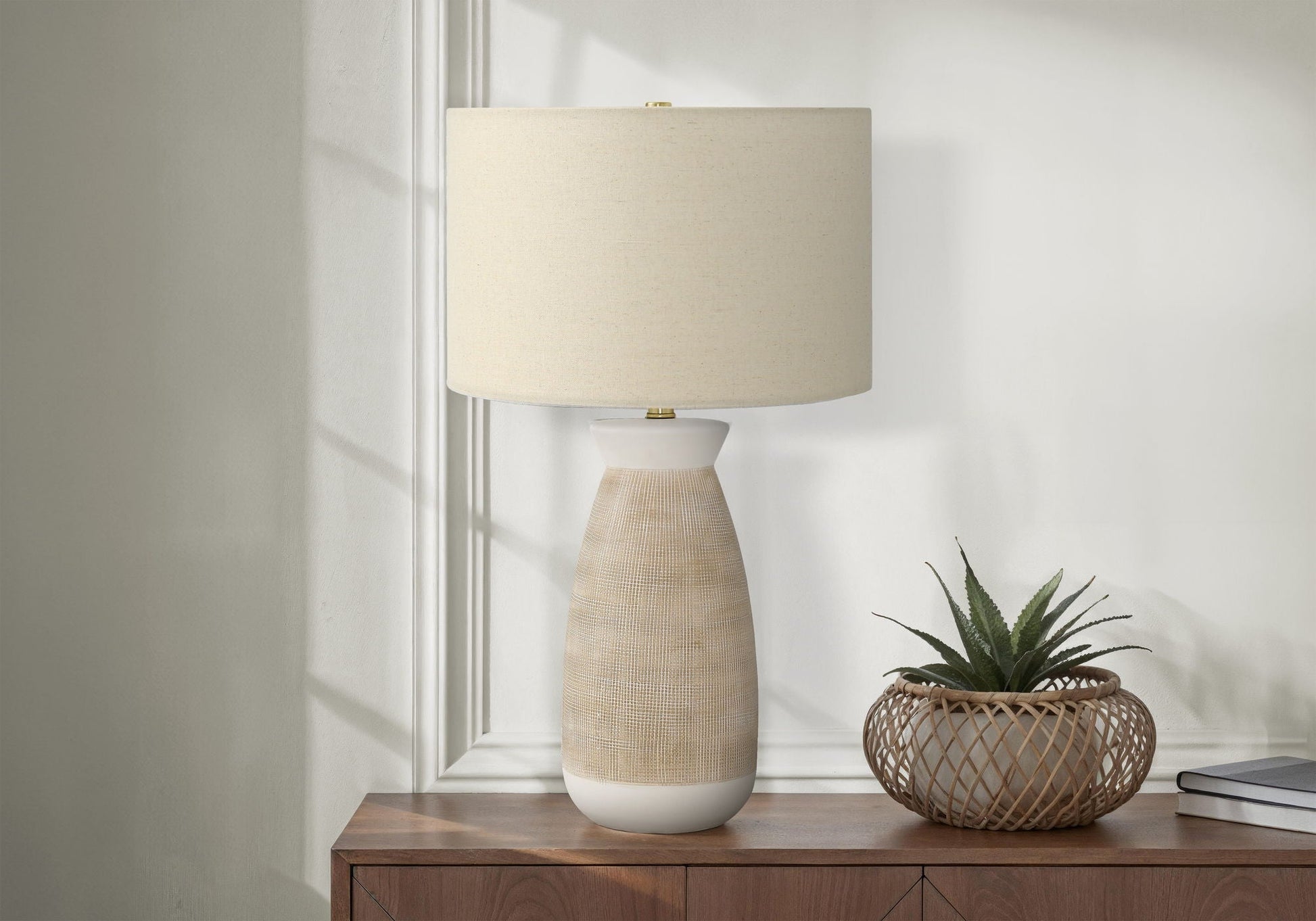 Table lamp ceramic resin base in cream with textured beige body and cream fabric shade on Tampa Home & Garden Store