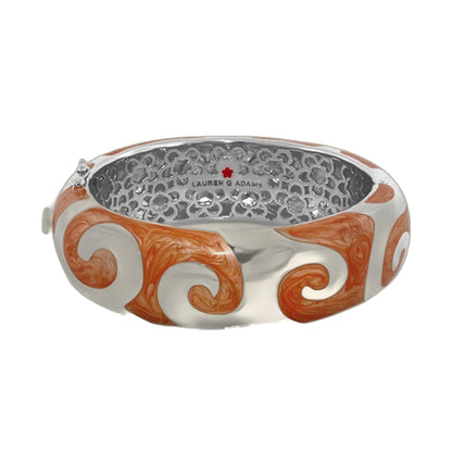 Good Karma Bangle by Lauren G Adams, hinged bracelet with safety lock, orange swirl exterior on Tampa Home & Garden Store