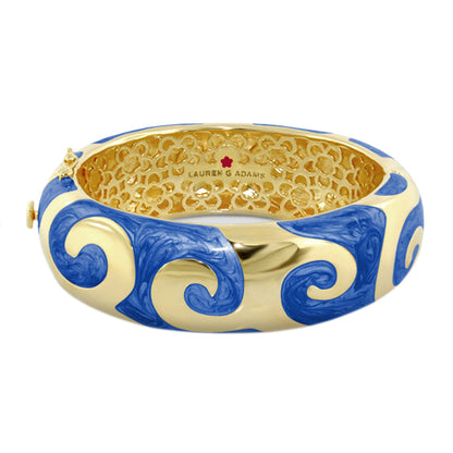 Good Karma Bangle hinged bracelet by Lauren G Adams in blue and gold enamel with swirl motifs on Tampa Home & Garden Store