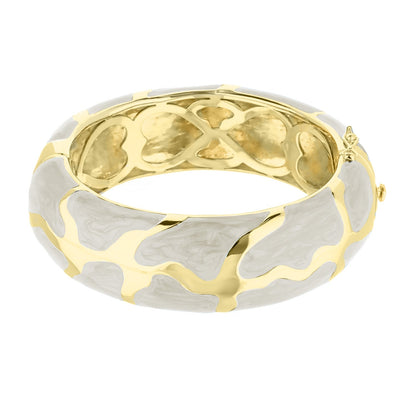 Puzzle Bangle, hinged gold-tone bracelet with white enamel puzzle design and safety lock on Tampa Home & Garden Store