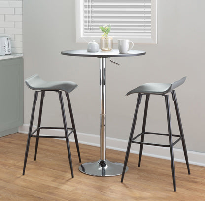 Contemporary adjustable bar table with hydraulic lift and round black top; two stools on Tampa Home & Garden Store