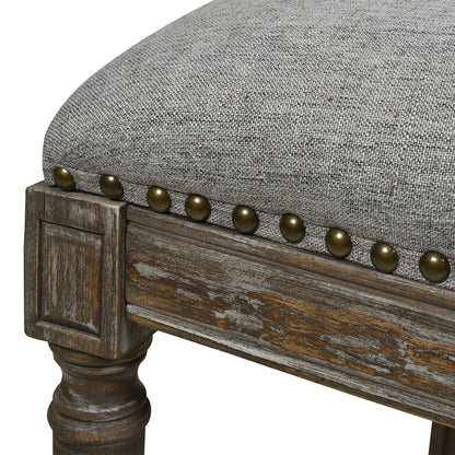 Rattan wicker high-back counter stool with gray fabric cushion, brass nailhead trim, oak frame on Tampa Home & Garden Store