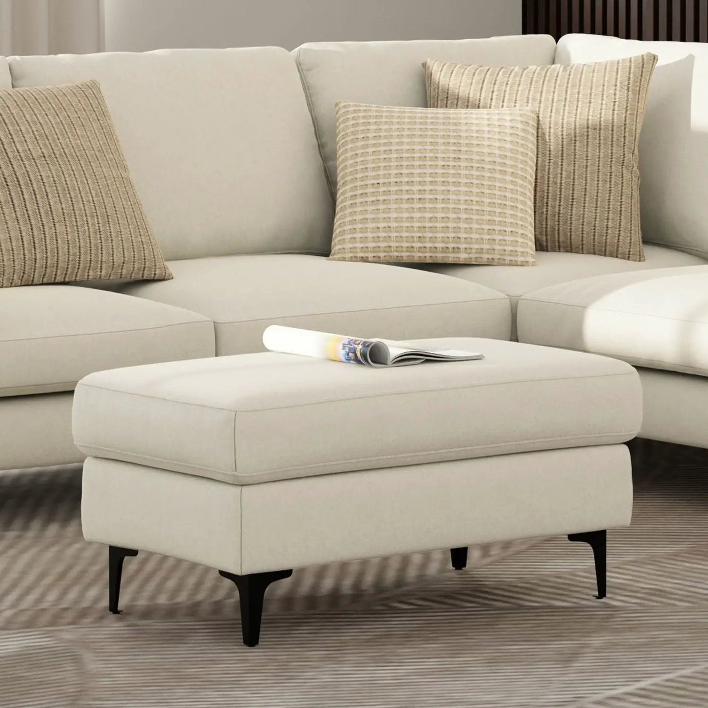 Ava versatile mid century upholstered ottoman in cream fabric with black tapered legs on Tampa Home & Garden Store