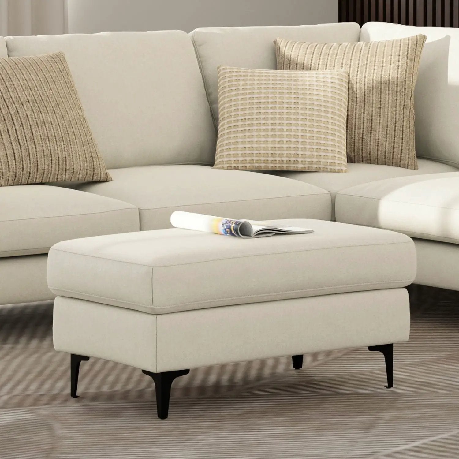 Ava versatile mid century upholstered ottoman in cream fabric with black tapered legs on Tampa Home & Garden Store