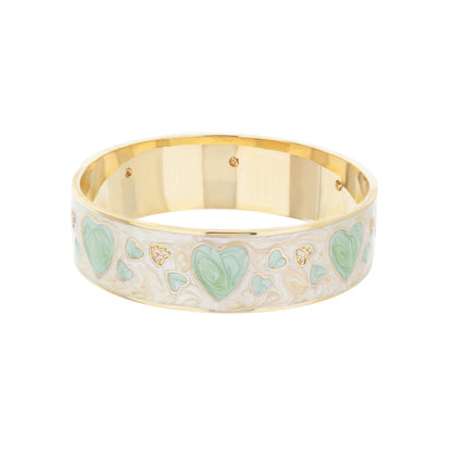 Lots of Love Slip-On Bangle by Lauren G Adams, gold-tone bracelet with mint enamel hearts on Tampa Home & Garden Store