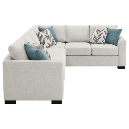 Radison greige sleeper sectional sofa with teal cushions and botanical pillows HouseOfZazla on Tampa Home & Garden Store