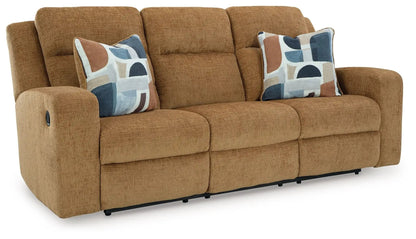 Kanlow reclining three-seat sofa in warm brown fabric with two pillows by Unique Piece Furniture on Tampa Home & Garden Store