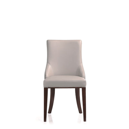 Shubert dining chair front view in beige faux leather with foam cushion and dark wood legs on Tampa Home & Garden Store