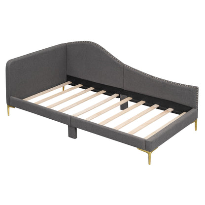 Upholstered daybed gray fabric curved headboard with nailhead trim and gold legs on Tampa Home & Garden Store