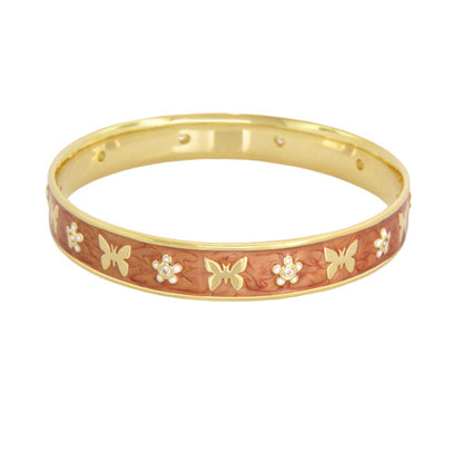 Butterfly World Bangle gold-tone bracelet with butterfly motifs by Lauren G Adams on Tampa Home & Garden Store