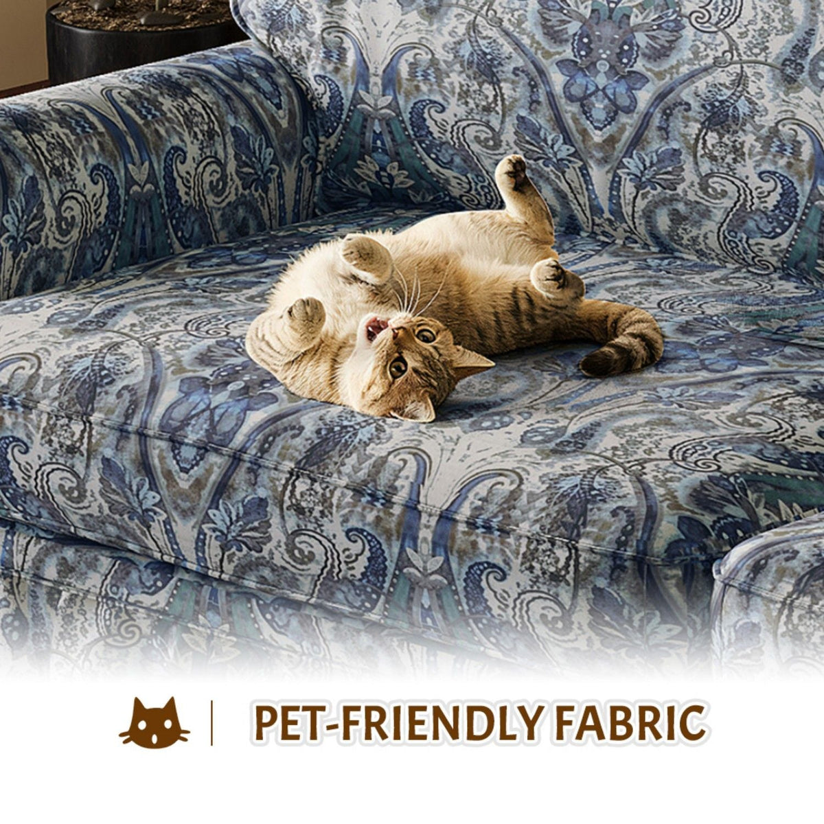 Comfortable Cloud Sofa with rolled arms and skirt in blue pattern fabric, cat on sofa on Tampa Home & Garden Store
