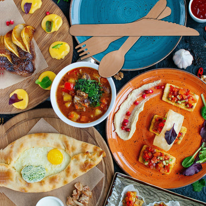 Natural Wood Cutlery And Utensils For A Party